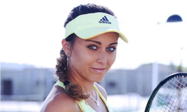 Choose the player you find the prettiest, currently playing on the WTA tour. Tell me what you thought of this test.