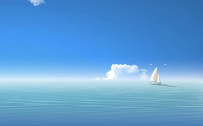 Ocean with a little ship clouds and the sky Ocean with a little ship clouds and the sky