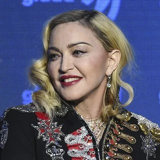 Choose a celebrity who is over 50 years old but looks very young