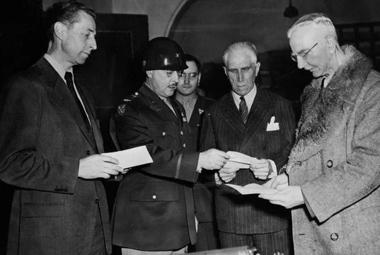 Fritsche, Papen and Schacht with Colonel Andrews (October 4, 1946) Fritsche, Papen and Schacht with Colonel Andrews (October 4, 1946)